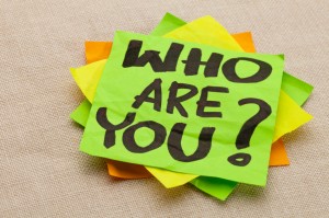 a post-it note that reads: Who Are You?